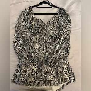Long sleeve Black and White Snake Print dress with cutout tie back